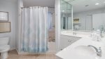 Private master bathroom with soaker tub/shower combination and dual vanities